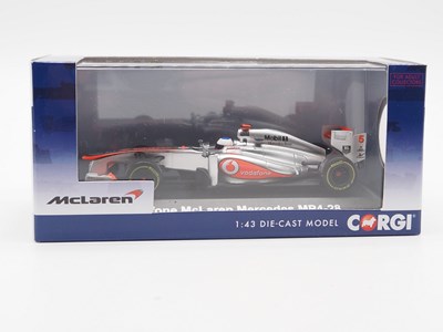 Lot 235 - A group of 1:43 scale Formula 1 race cars by...