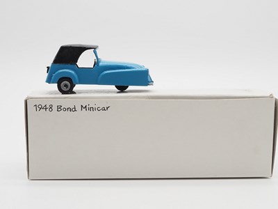 Lot 348 - A pair of 1:43 scale hand built white metal...