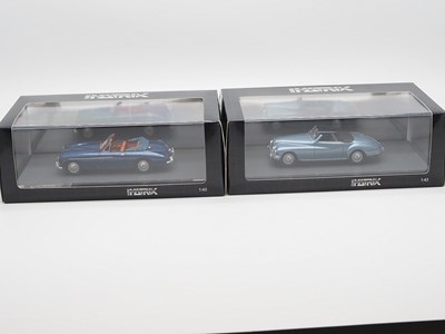 Lot 354 - A pair of hand built limited edition resin...