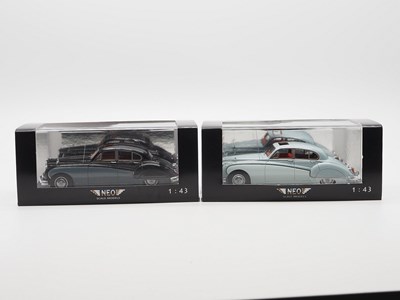 Lot 399 - A pair of hand built resin 1:43 scale models...