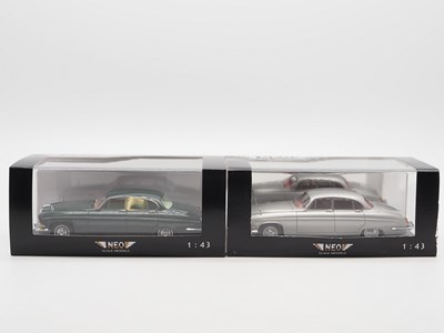 Lot 400 - A pair of hand built resin 1:43 scale models...