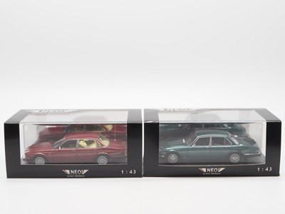 Lot 401 - A pair of hand built resin 1:43 scale models...