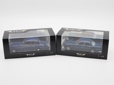 Lot 423 - A pair of hand built resin 1:43 scale models...