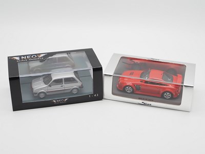 Lot 454 - A pair of 1:43 scale hand built resin models...