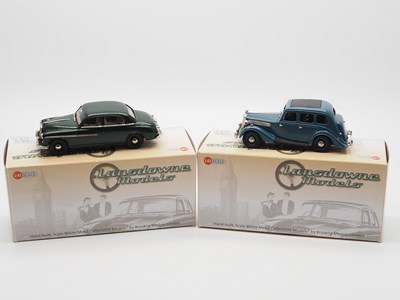 Lot 529 - A pair of hand built 1:43 scale white metal...