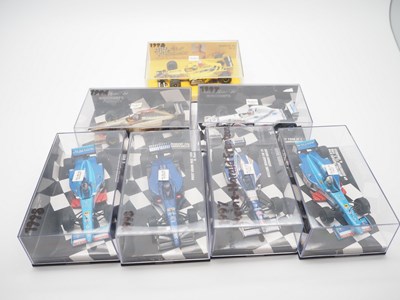 Lot 203 - A group of 1:43 scale Formula 1 race cars by...