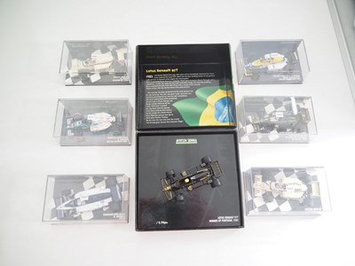 Lot 200 - A group of 1:43 scale Formula 1 race cars by...