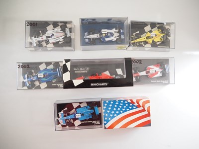 Lot 204 - A group of 1:43 scale Formula 1 race cars by...