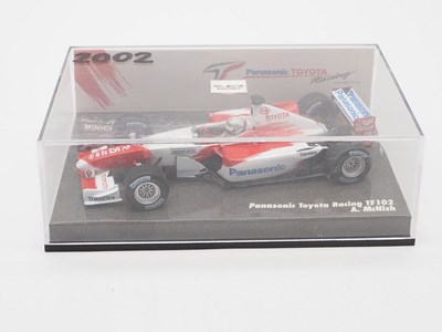 Lot 204 - A group of 1:43 scale Formula 1 race cars by...