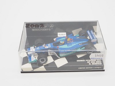 Lot 204 - A group of 1:43 scale Formula 1 race cars by...