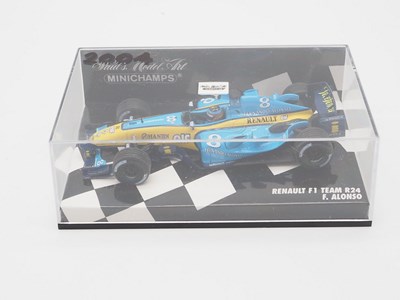 Lot 206 - A group of 1:43 scale Formula 1 race cars by...