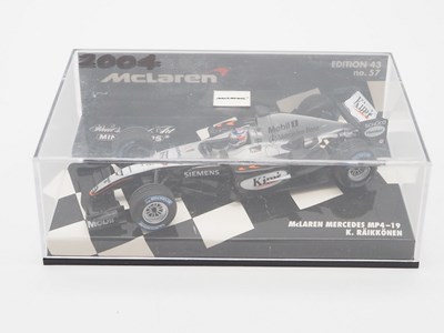 Lot 206 - A group of 1:43 scale Formula 1 race cars by...