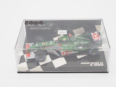 Lot 206 - A group of 1:43 scale Formula 1 race cars by...