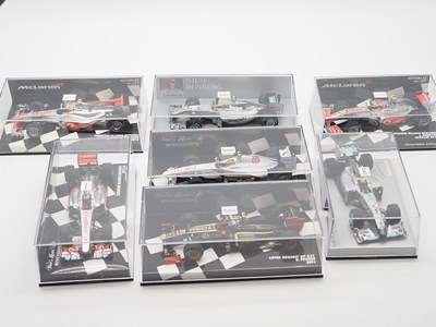 Lot 210 - A group of 1:43 scale Formula 1 race cars by...