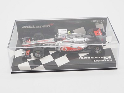 Lot 210 - A group of 1:43 scale Formula 1 race cars by...