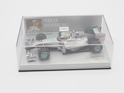 Lot 210 - A group of 1:43 scale Formula 1 race cars by...