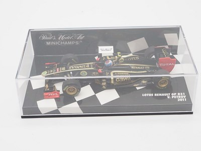 Lot 210 - A group of 1:43 scale Formula 1 race cars by...