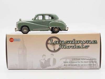 Lot 337 - A pair of hand built 1:43 scale white metal...