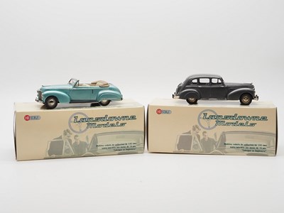 Lot 391 - A pair of hand built 1:43 scale white metal...