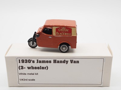 Lot 428 - A pair of 1:43 scale hand built white metal...