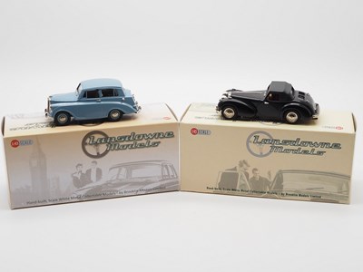 Lot 517 - A pair of hand built 1:43 scale white metal...