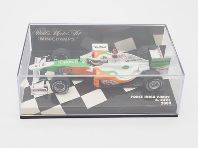 Lot 209 - A group of 1:43 scale Formula 1 race cars by...