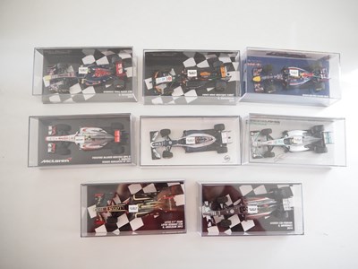 Lot 211 - A group of 1:43 scale Formula 1 race cars by...