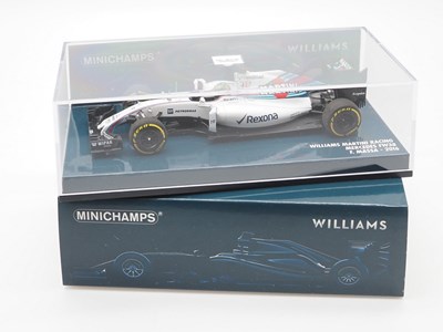 Lot 212 - A group of 1:43 scale Formula 1 race cars by...