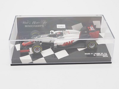 Lot 212 - A group of 1:43 scale Formula 1 race cars by...