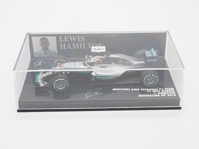 Lot 212 - A group of 1:43 scale Formula 1 race cars by...