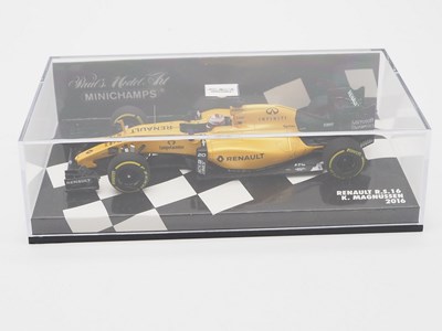 Lot 212 - A group of 1:43 scale Formula 1 race cars by...