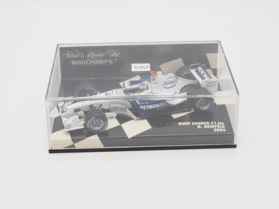 Lot 208 - A group of 1:43 scale Formula 1 race cars by...