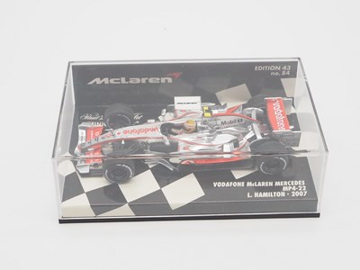 Lot 208 - A group of 1:43 scale Formula 1 race cars by...