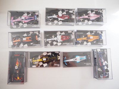 Lot 213 - A group of 1:43 scale Formula 1 race cars by...