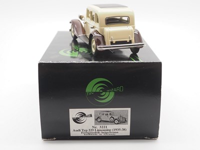 Lot 6 - A 1:43 scale TIN WIZARD hand built model of a...