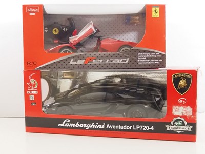 Lot 105 - A pair of 1:12 scale radio controlled super...