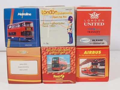 Lot 15 - A group of 1:76 scale diecast buses by...