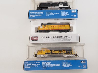 Lot 194 - A group of HO gauge American outline diesel...