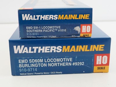 Lot 235 - A pair of WALTHERS MAINLINE HO gauge diesel...