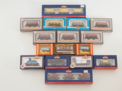 Lot 416 - A group of OO gauge mixed wagons by BACHMANN,...