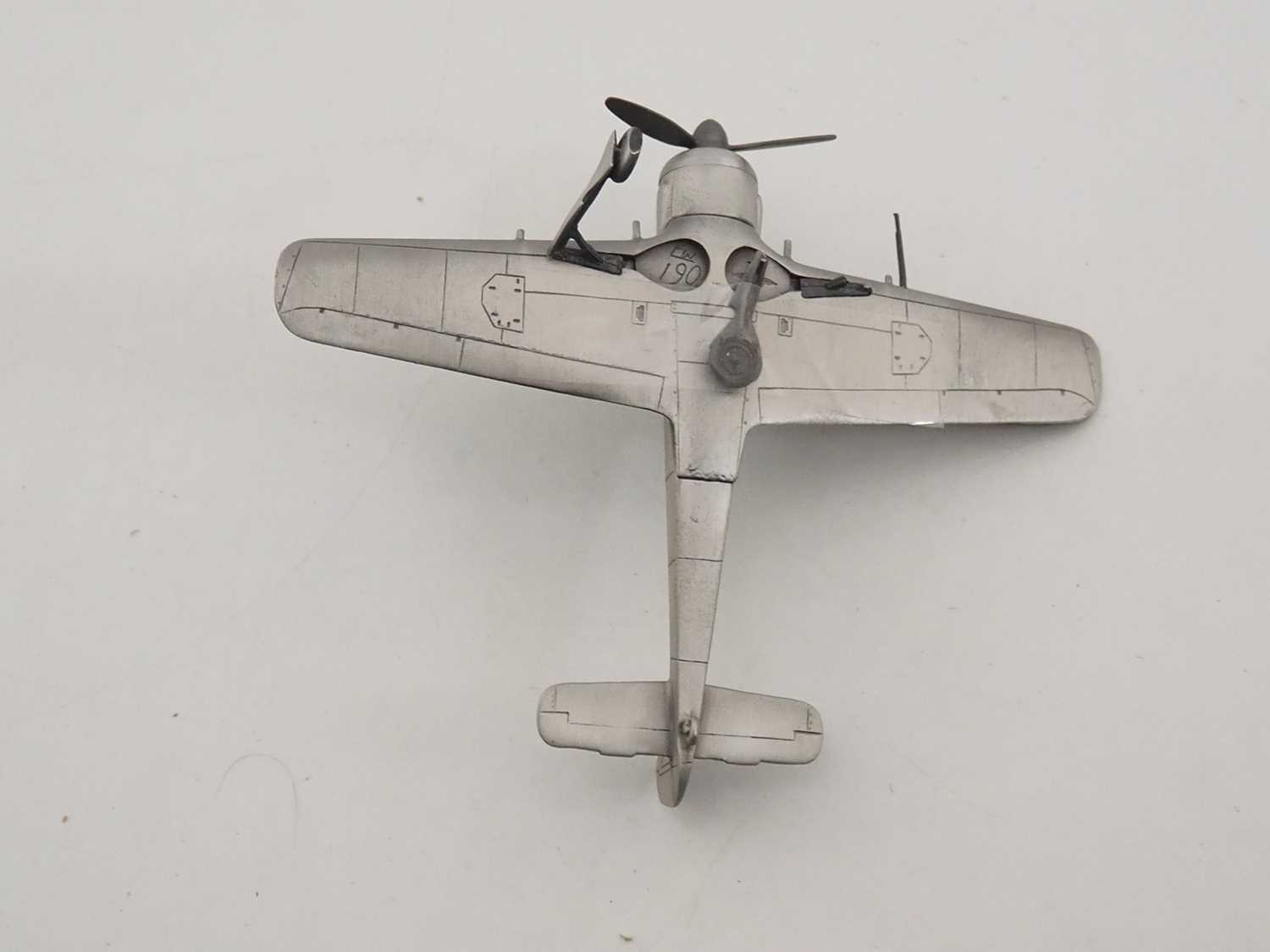 Lot 44 - A group of pewter models of military aircraft