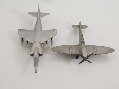 Lot 44 - A group of pewter models of military aircraft...