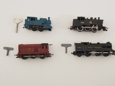 Lot 461 - A group of OO gauge clockwork steam and diesel...