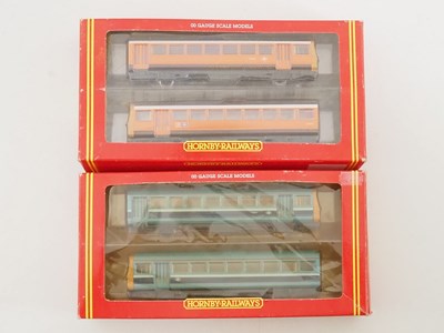 Lot 473 - A pair of HORNBY OO gauge class 142 Pacer...