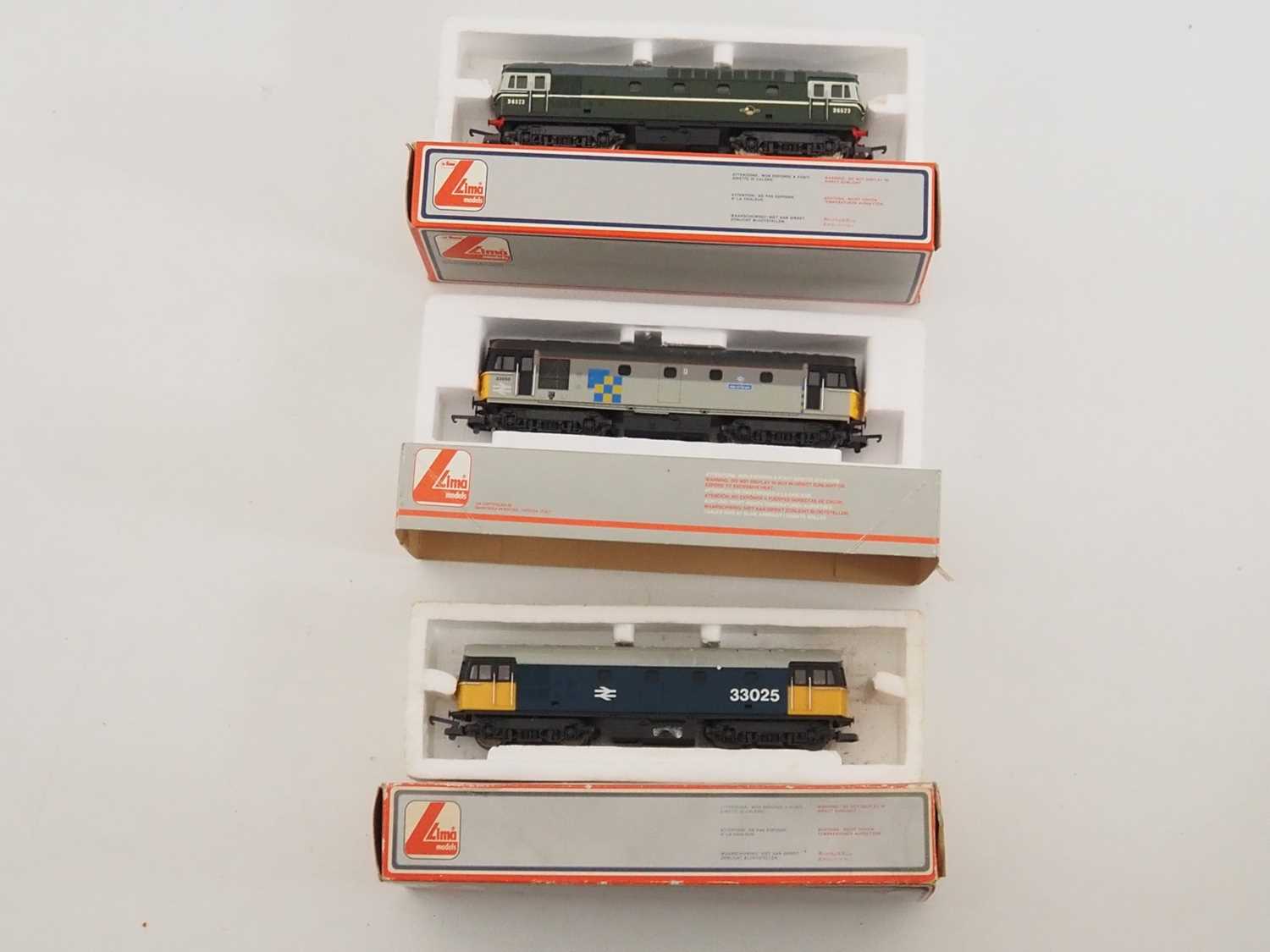 Lot 479 - A group of LIMA OO gauge class 33 diesel...