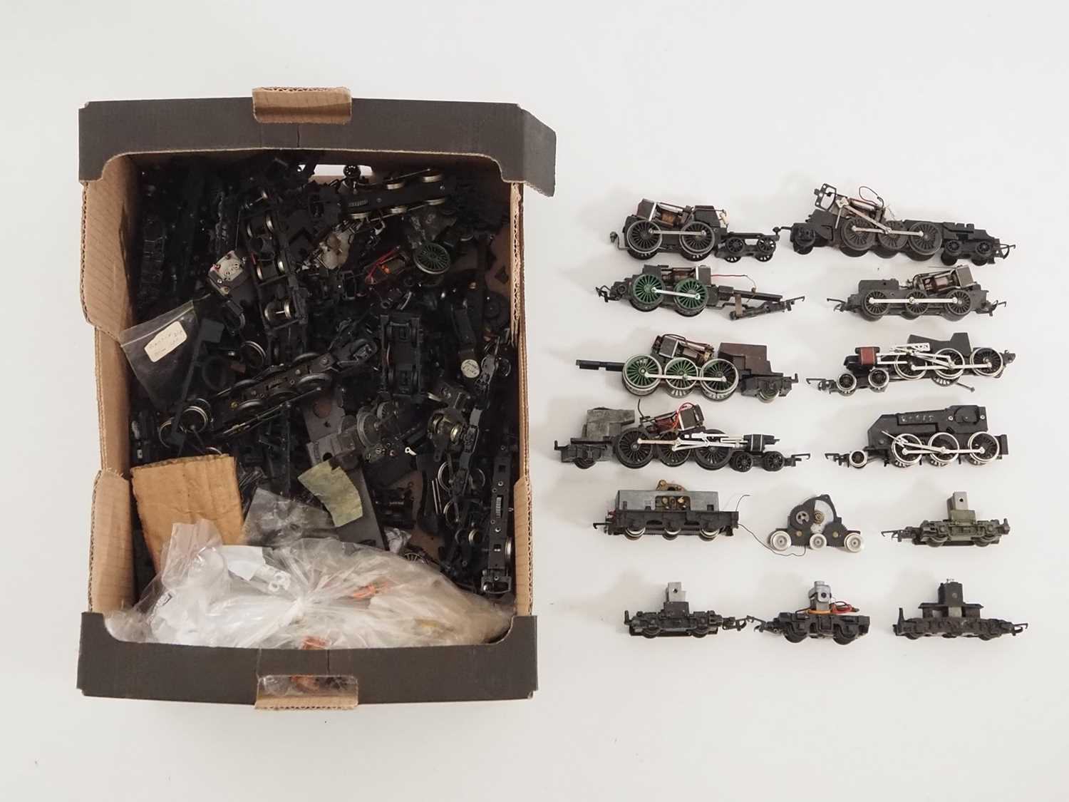 Lot 549 - A large quantity of OO gauge chassis, motor...