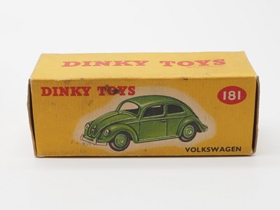 Lot 56 - A group of DINKY Toys plus an empty box,...