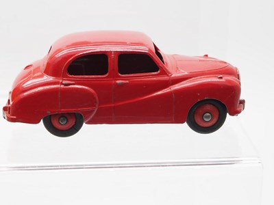Lot 57 - A group of DINKY Toys, comprising 161 Austin...