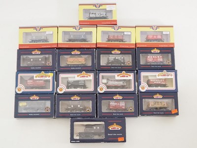 Lot 587 - A group of OO gauge mixed wagons by BACHMANN...