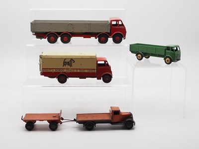 Lot 60 - A group of DINKY trucks, comprising of a 501...